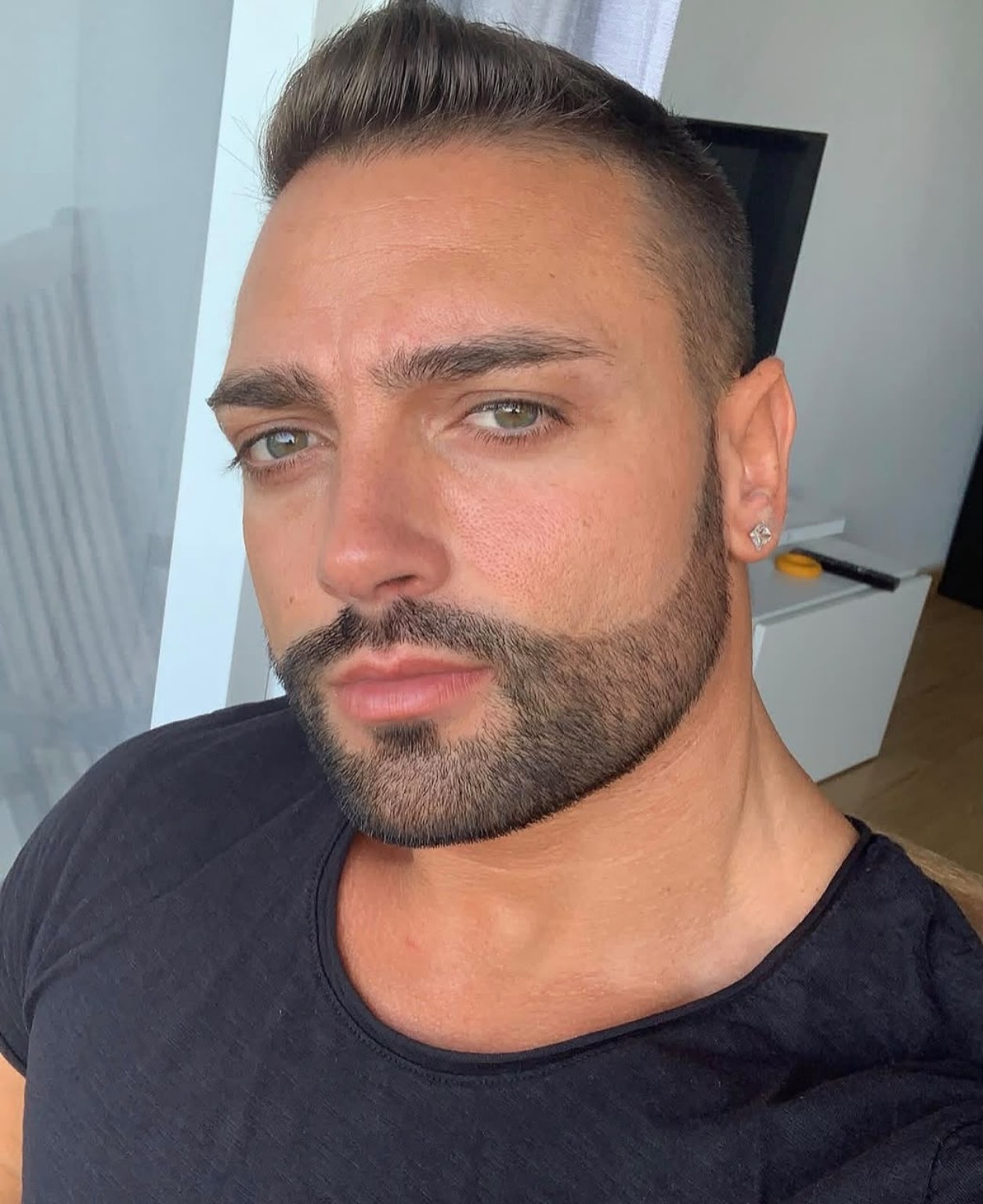 Close-up portrait in a black T-shirt